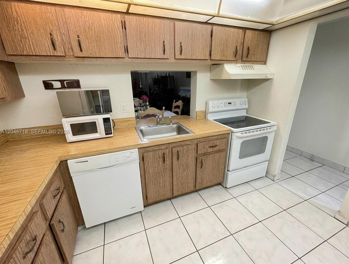 2800 NW 56th Ave # B207, Lauderhill, FL 33313 photo 6