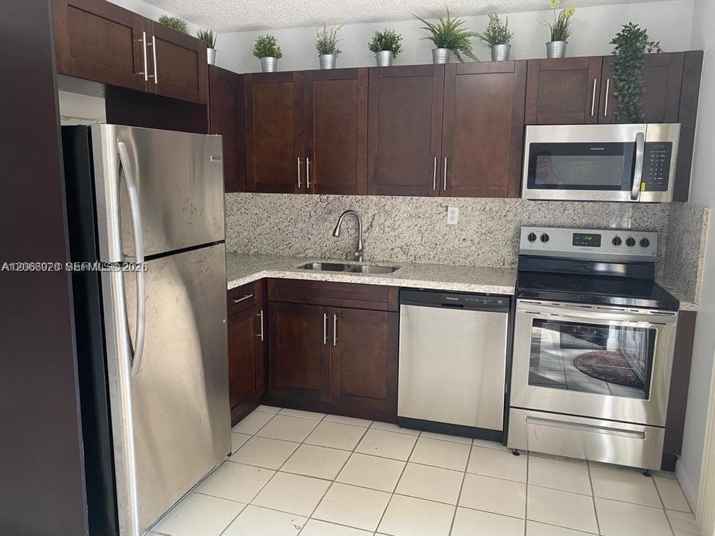 560 NW 82nd Pl # 305, Miami, FL 33126 photo 5