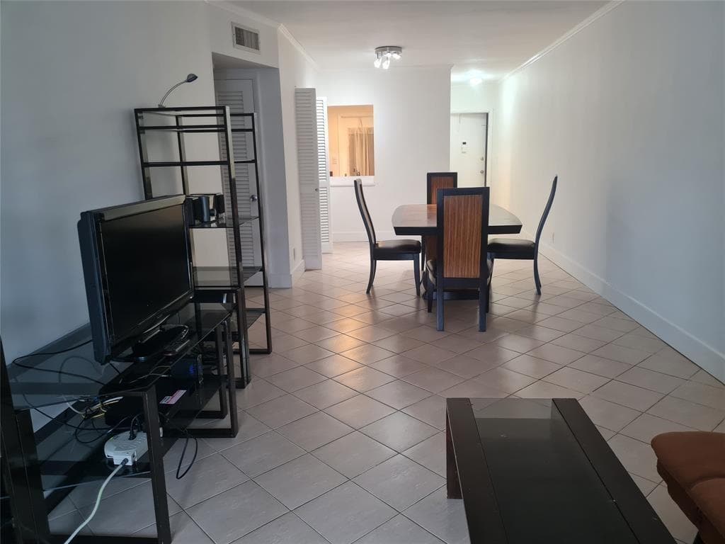 300 Golden Isles Drive # 104, Hallandale Beach, FL 33009 photo 2