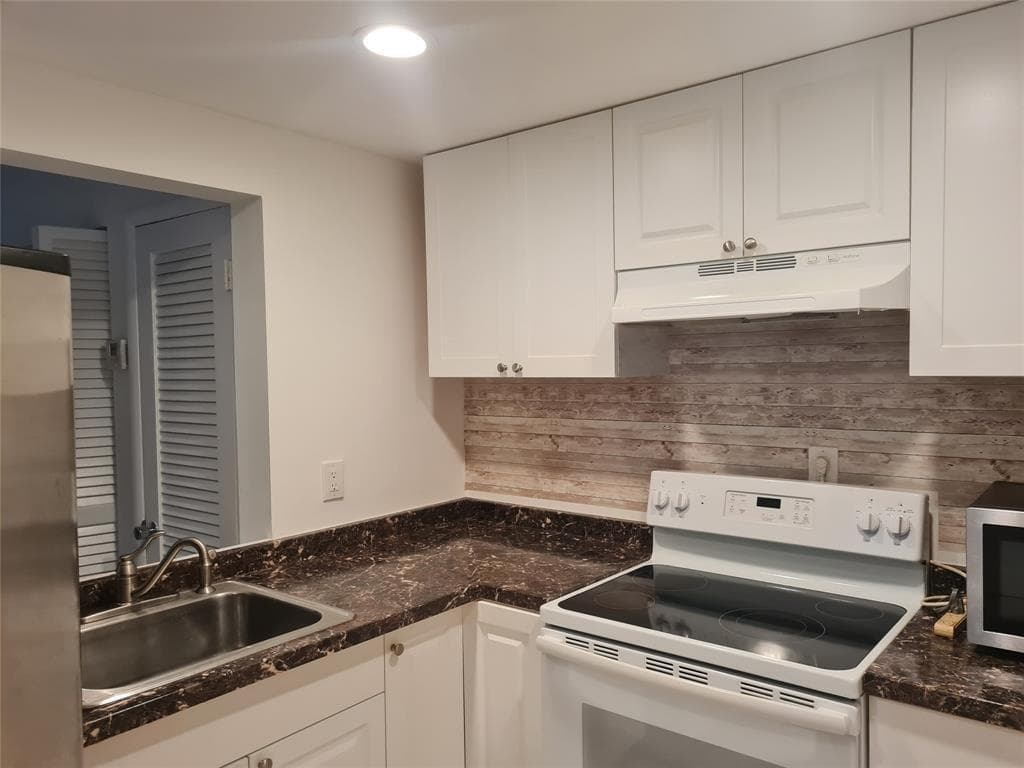 300 Golden Isles Drive # 104, Hallandale Beach, FL 33009 photo 13