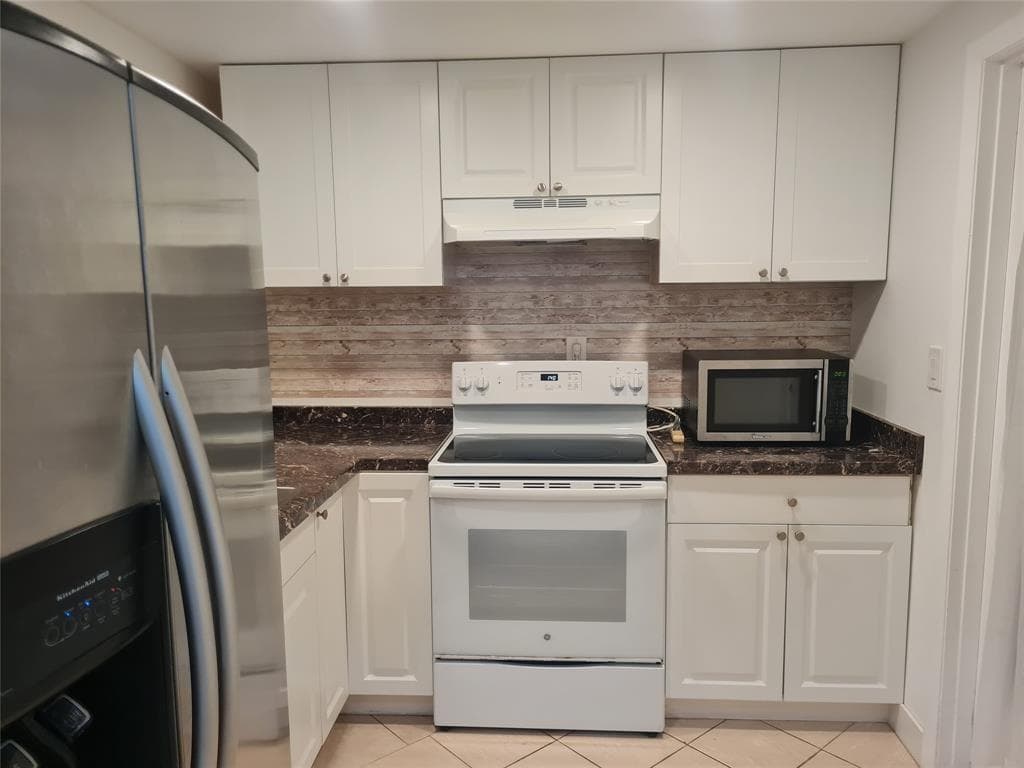 300 Golden Isles Drive # 104, Hallandale Beach, FL 33009 photo 3