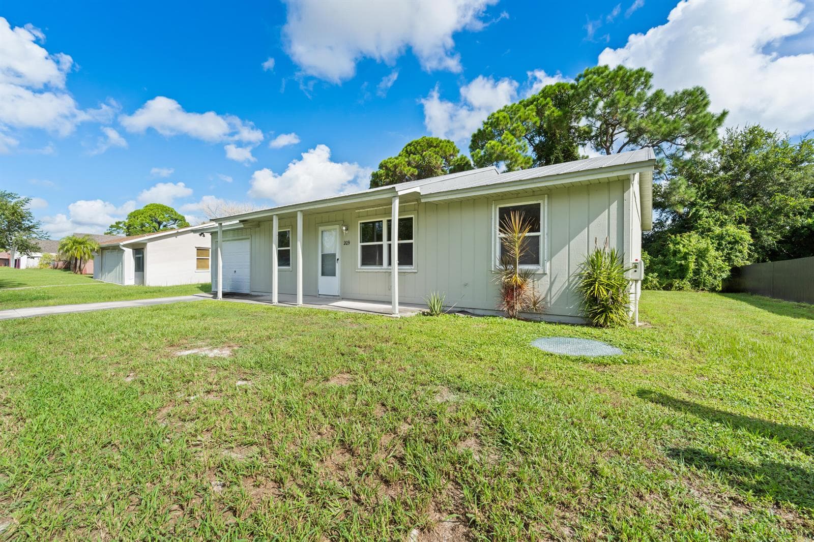 209 SW CHAPMAN Avenue, Port St. Lucie, FL 34984 photo 2