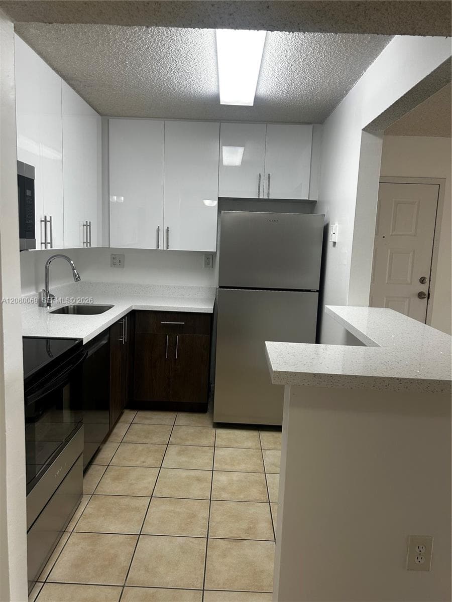 7180 NW 179th St # 211, Hialeah, FL 33015