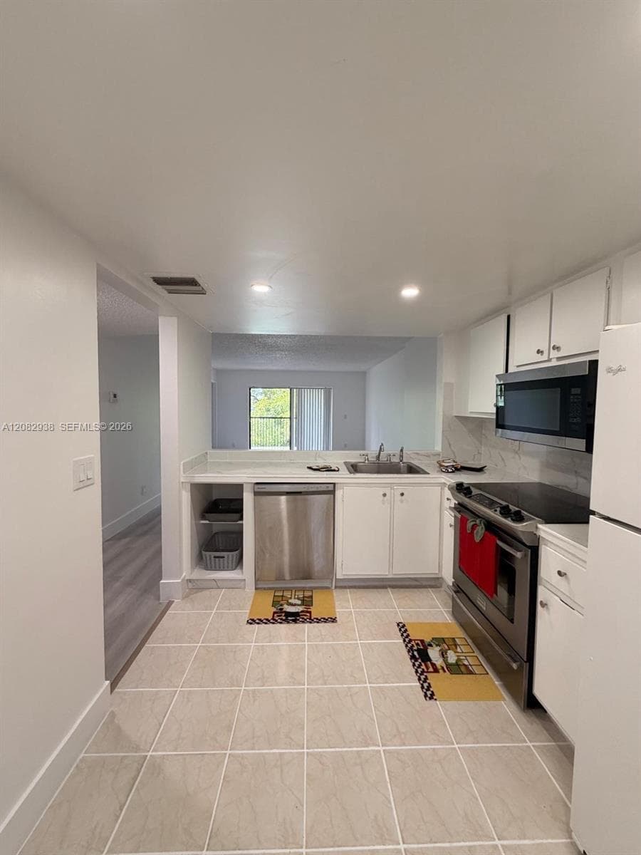 6575 W Oakland Park Blvd # 303, Lauderhill, FL 33313 photo 2