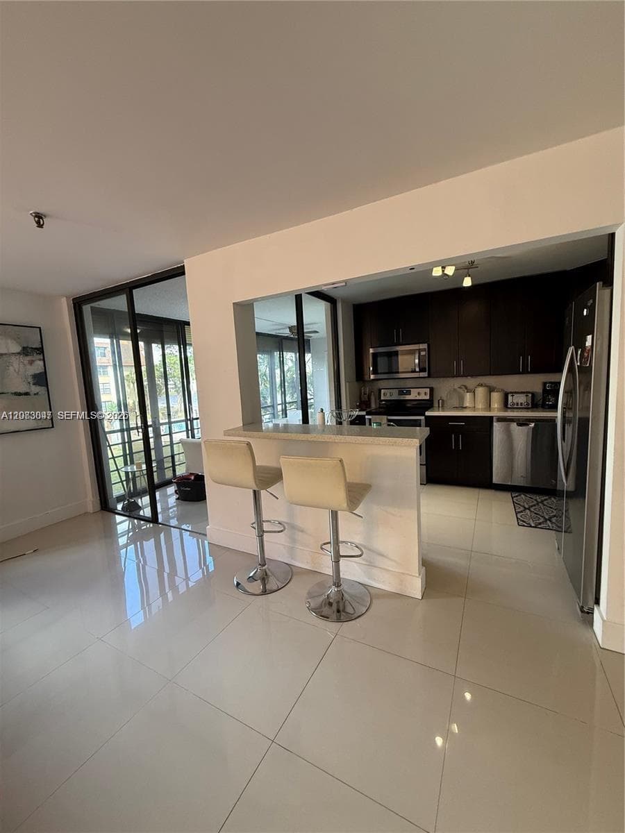 671 NE 195th St # 227-E, Miami, FL 33179 photo 2