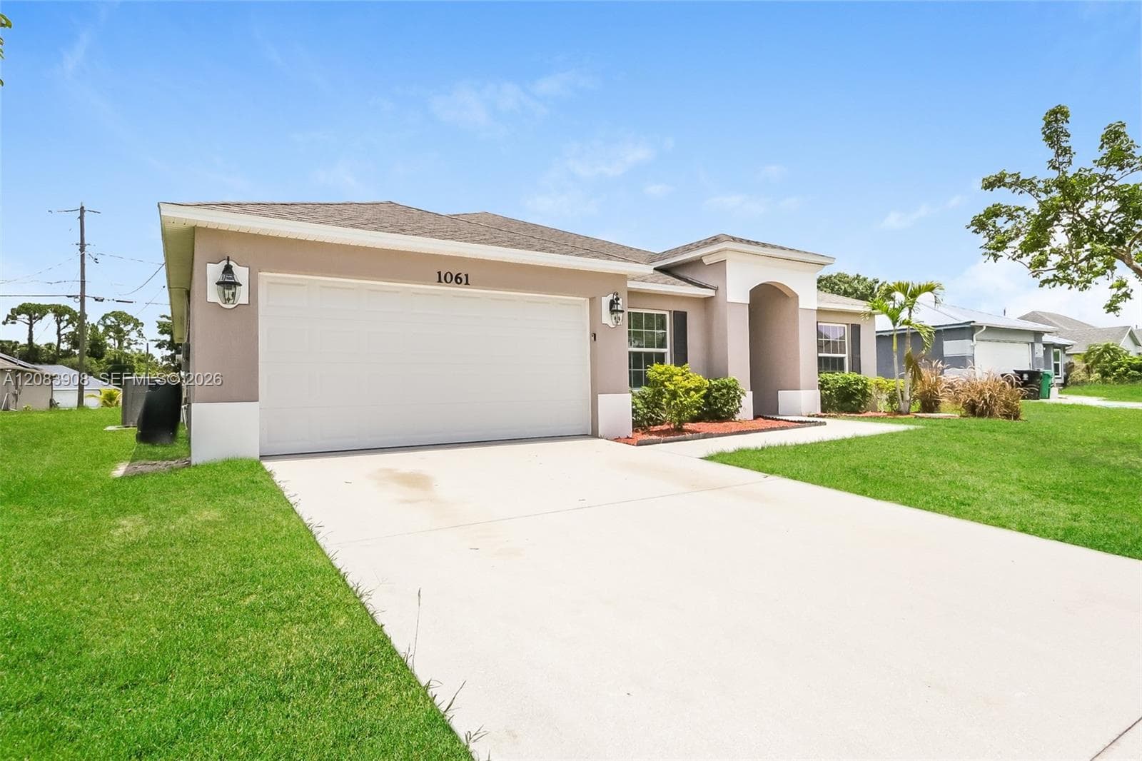 1061 SW Dubois Ave, Port St. Lucie, FL 34953 photo 2