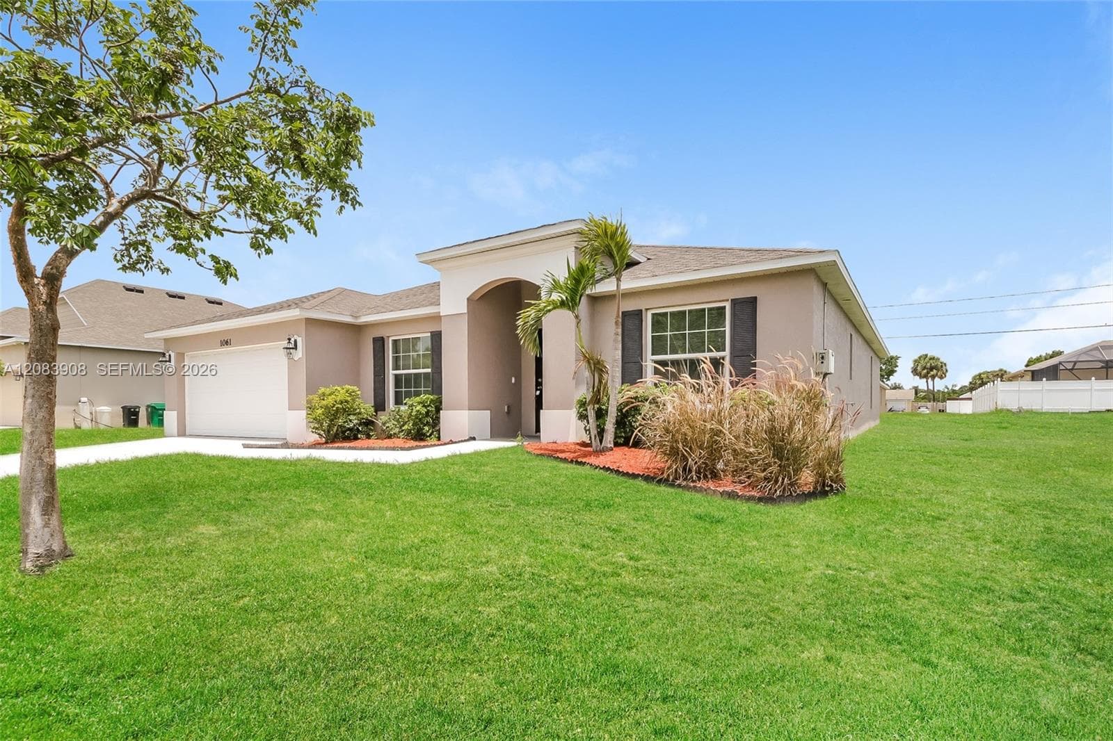 1061 SW Dubois Ave, Port St. Lucie, FL 34953 photo 3