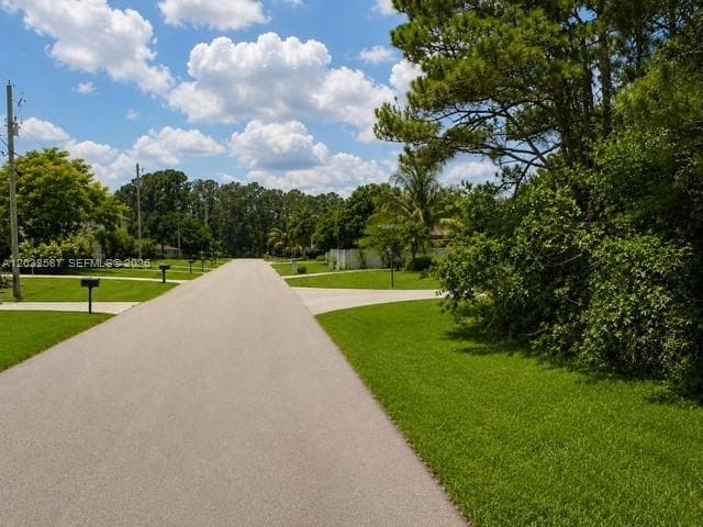 1585 SW Mullinax Ave, Port St. Lucie, FL 34953 photo 2
